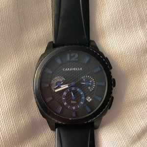 Men’s Caravelle watch style 45B159. Used in good condition. Silicone band